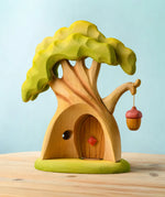Bumbu toys handcrafted fairy treehouse showing hollow back, removable door and a hanging lantern