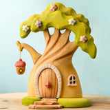Bumbu toys handcrafted wooden fairy treehouse with a hanging lantern and a removable door