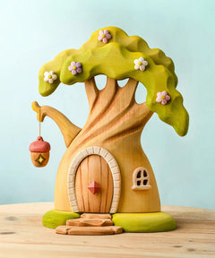 Bumbu toys handcrafted wooden fairy treehouse with a hanging lantern and a removable door