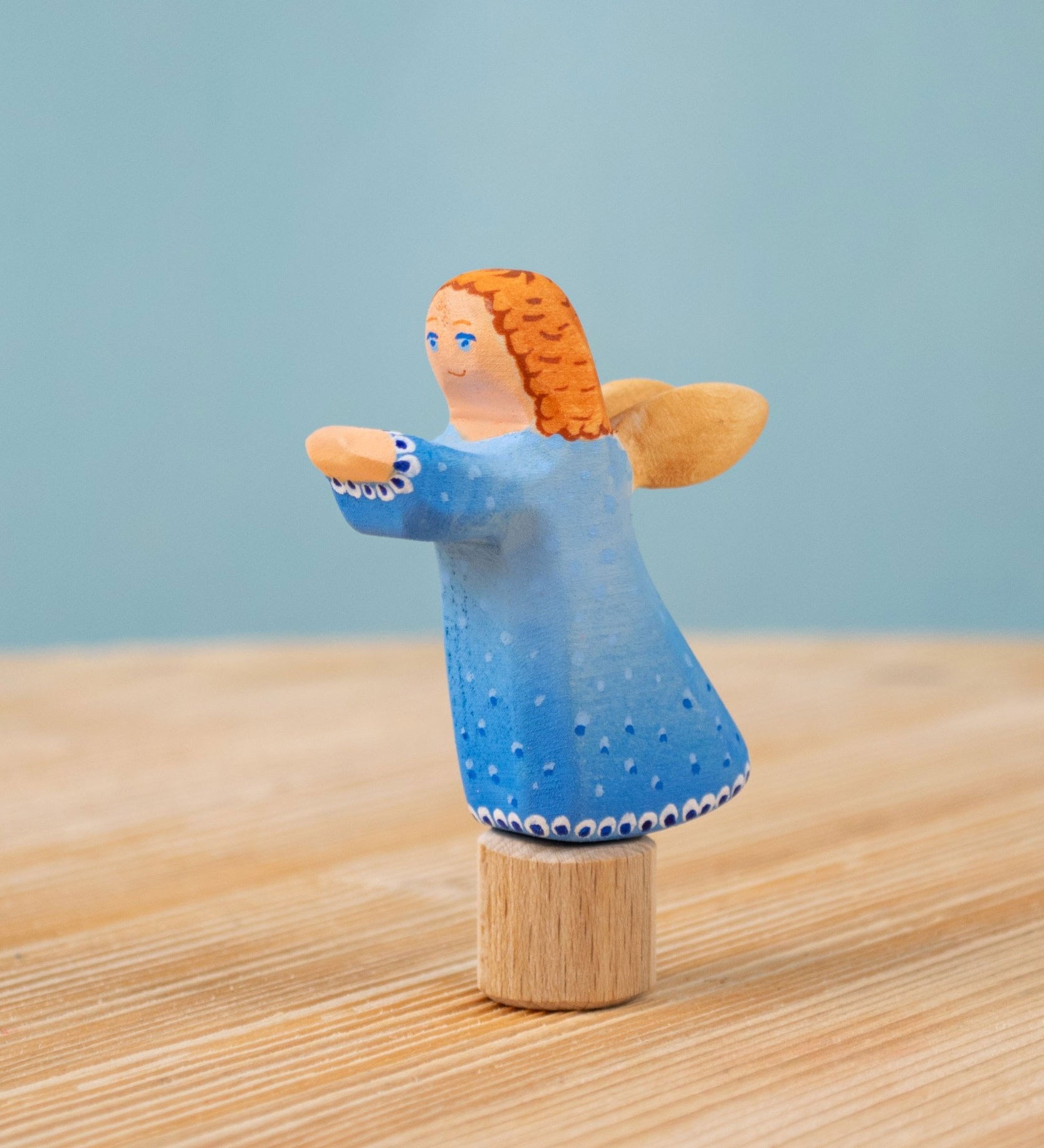 Bumbu blue Festive Angel Celebration decorative Figure to fit on a Grimm's celebration ring. These festive figures are perfect for your Christmas celebration ring set up. These expertly hand crafted items are part of a large range of wooden toys available here at Babipur. 