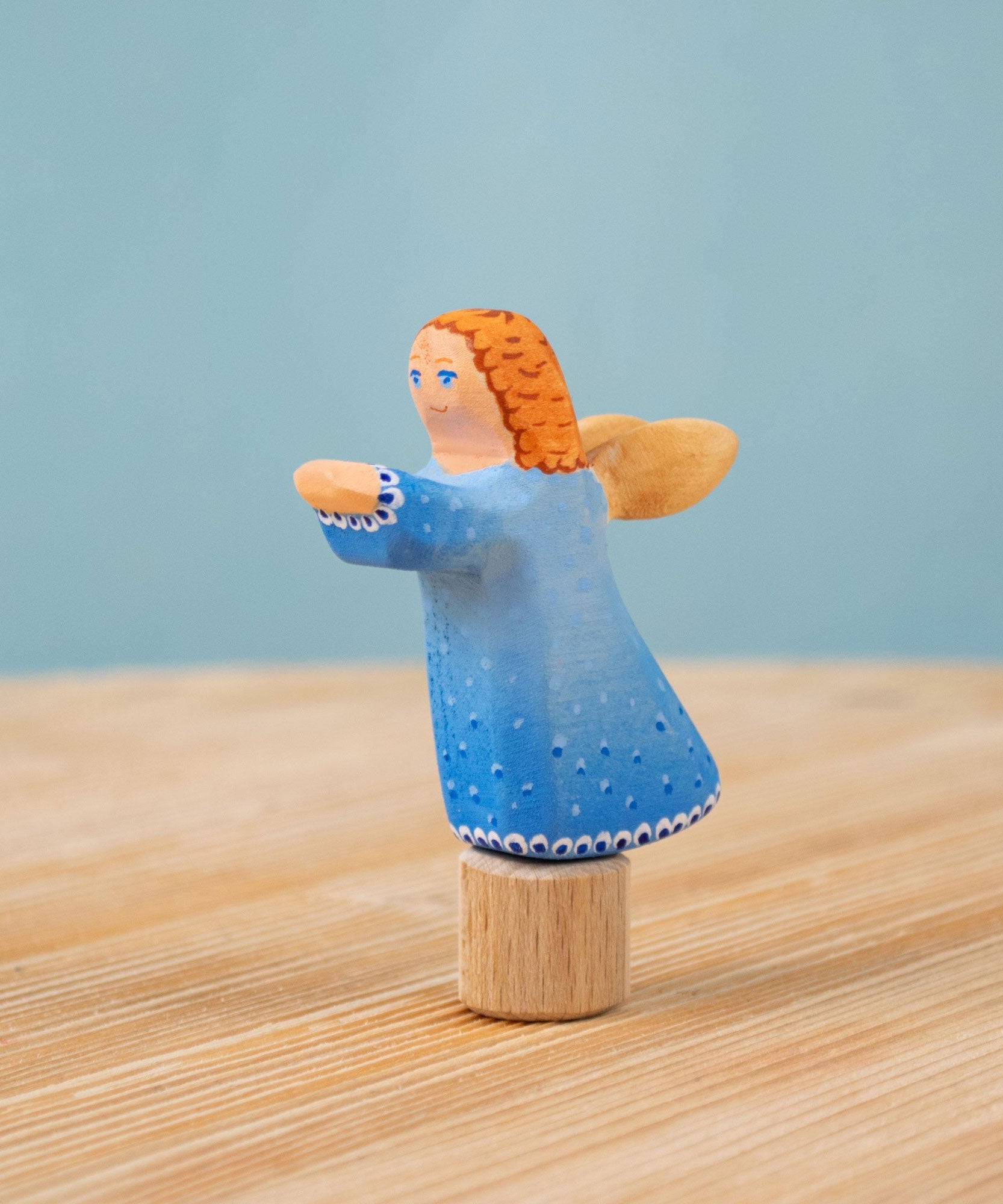 Bumbu blue Festive Angel Celebration decorative Figure to fit on a Grimm's celebration ring. These festive figures are perfect for your Christmas celebration ring set up. These expertly hand crafted items are part of a large range of wooden toys available here at Babipur. 
