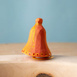 Bumbu Festive Bell Celebration decorative Figure to fit on a Grimm's celebration ring. These festive figures are perfect for your Christmas celebration ring set up. These expertly hand crafted items are part of a large range of wooden toys available here at Babipur. 