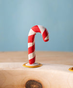 Bumbu red and white Festive Candy Cane Celebration ring decorative Figure to fit on a Grimm's celebration ring. These festive figures are perfect for your Christmas celebration ring set up. These expertly hand crafted items are part of a large range of wooden toys available here at Babipur. 