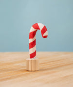Bumbu red and white Festive Candy Cane Celebration ring decorative Figure to fit on a Grimm's celebration ring. These festive figures are perfect for your Christmas celebration ring set up. These expertly hand crafted items are part of a large range of wooden toys available here at Babipur. 