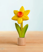 Bumbu handcrafted wooden yellow festive daffodil figure standing on wooden base for Grimms celebration ring