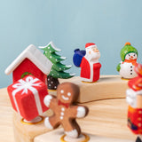 Bumbu Festive Celebration ring decorative Figures on a celebration ring. These festive figures are perfect for your Chritmas celebration ring set up. Bumbu red Festive Gift Celebration decorative Figure to fit on a Grimm's celebration ring. These festive figures are perfect for your Christmas celebration ring set up. These expertly hand crafted items are part of a large range of wooden toys available here at Babipur. 