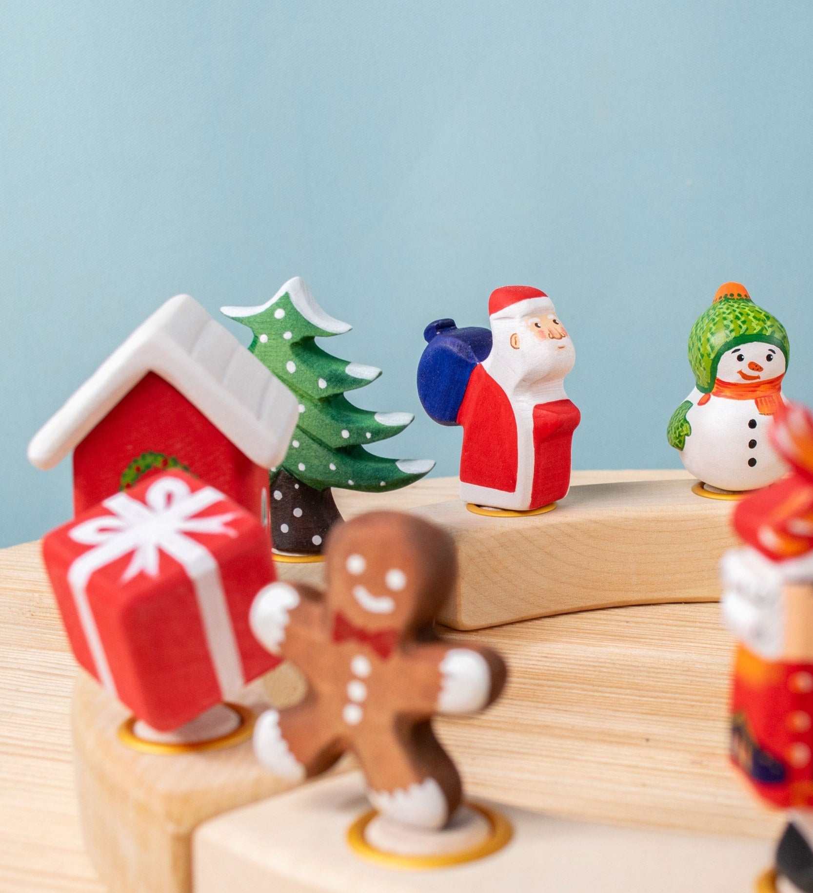 Bumbu Festive Celebration ring decorative Figures on a celebration ring. These festive figures are perfect for your Chritmas celebration ring set up. Bumbu red Festive Gift Celebration decorative Figure to fit on a Grimm's celebration ring. These festive figures are perfect for your Christmas celebration ring set up. These expertly hand crafted items are part of a large range of wooden toys available here at Babipur. 