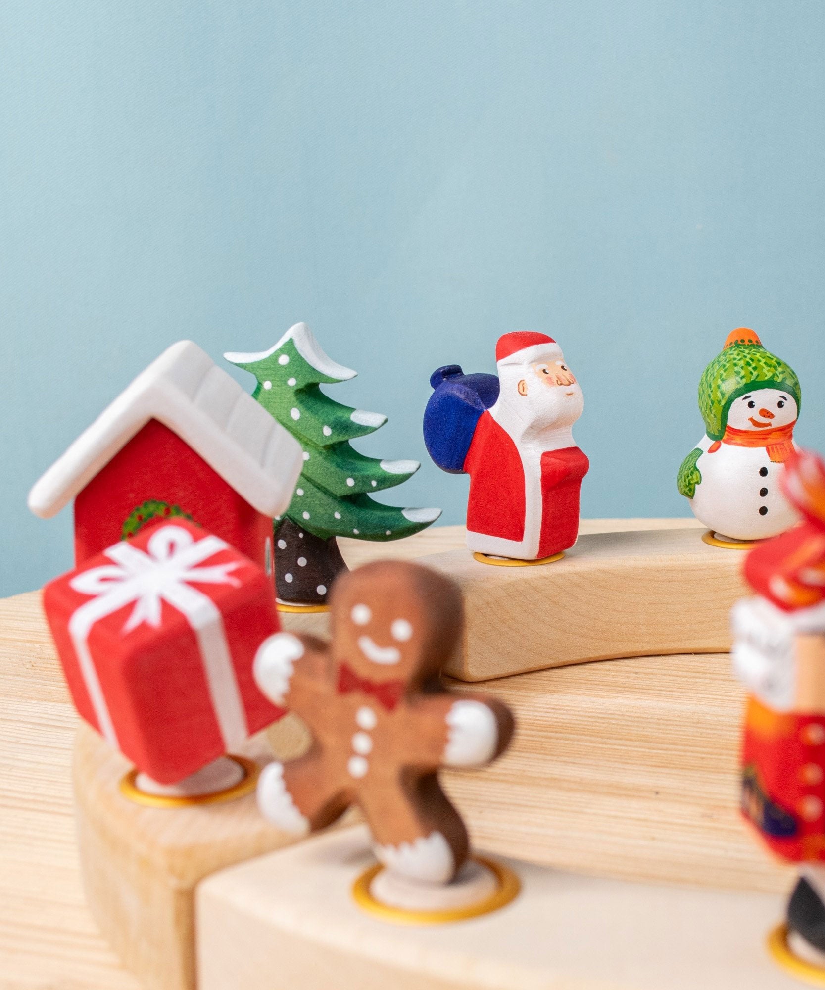 Bumbu Festive Celebration ring decorative Figures on a celebration ring. These festive figures are perfect for your Chritmas celebration ring set up. Bumbu red Festive Gift Celebration decorative Figure to fit on a Grimm's celebration ring. These festive figures are perfect for your Christmas celebration ring set up. These expertly hand crafted items are part of a large range of wooden toys available here at Babipur. 