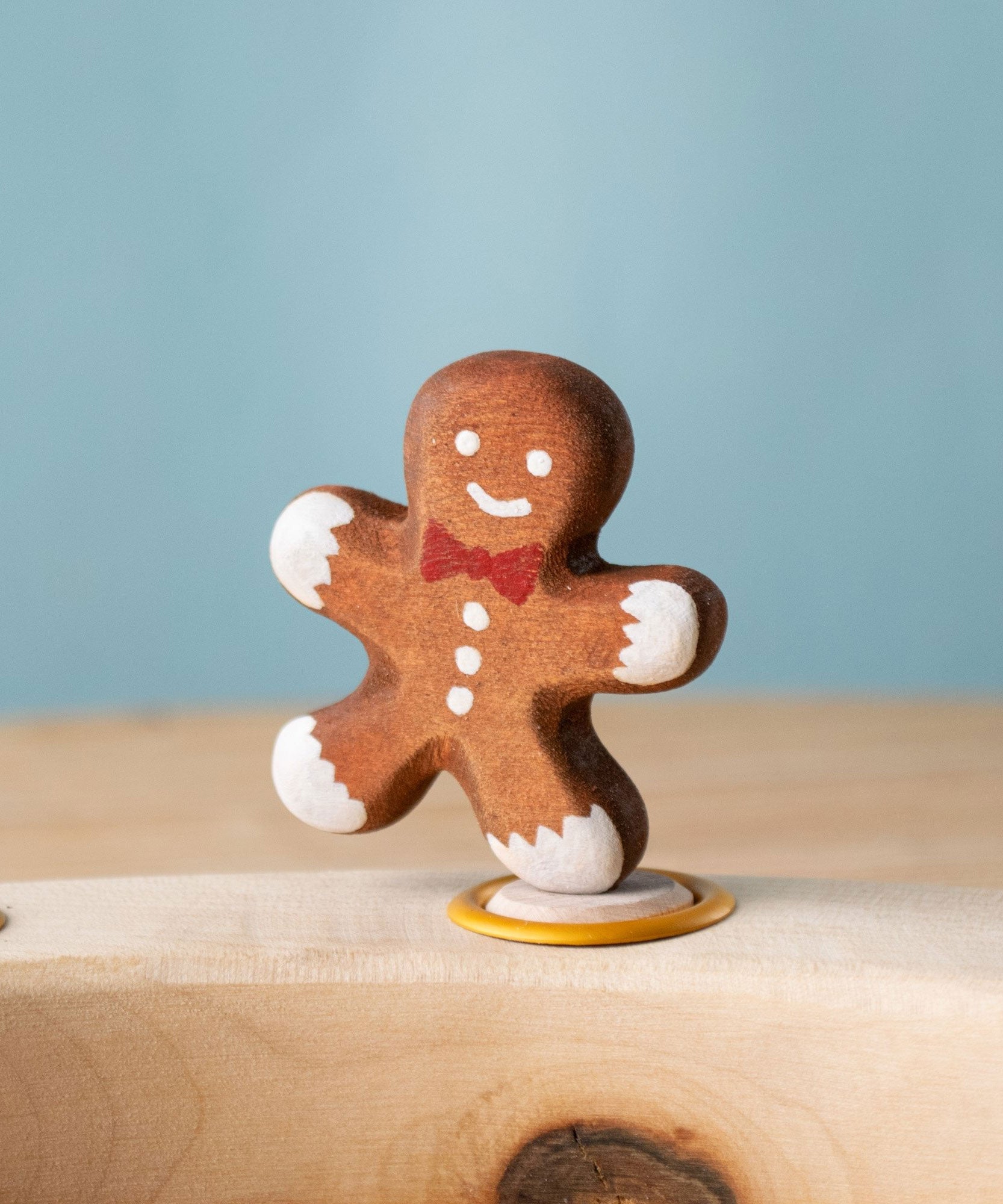 Bumbu Festive Gingerbread man Celebration decorative Figure to fit on a Grimm's celebration ring. These festive figures are perfect for your Christmas celebration ring set up. These expertly hand crafted items are part of a large range of wooden toys available here at Babipur. 