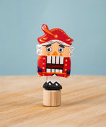 Bumbu red Festive Nutcracker Celebration decorative Figure to fit on a Grimm's celebration ring. These festive figures are perfect for your Christmas celebration ring set up. These expertly hand crafted items are part of a large range of wooden toys available here at Babipur. 