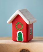 Bumbu red Festive house Celebration decorative Figure to fit on a Grimm's celebration ring. These festive figures are perfect for your Christmas celebration ring set up. These expertly hand crafted items are part of a large range of wooden toys available here at Babipur. 