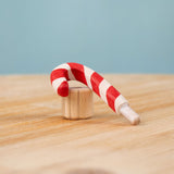 Bumbu red and white Festive Candy Cane Celebration ring decorative Figure to fit on a Grimm's celebration ring. These festive figures are perfect for your Christmas celebration ring set up. These expertly hand crafted items are part of a large range of wooden toys available here at Babipur. 