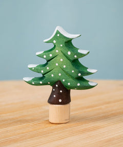 Bumbu Festive Tree Celebration decorative Figure to fit on a Grimm's celebration ring. The figure is a green fir tree decorated with snow. These festive figures are perfect for your Christmas celebration ring set up. These expertly hand crafted items are part of a large range of wooden toys available here at Babipur. 