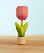 Bumbu handcrafted wooden pink festive tulip figure standing on wooden base for Grimms celebration ring