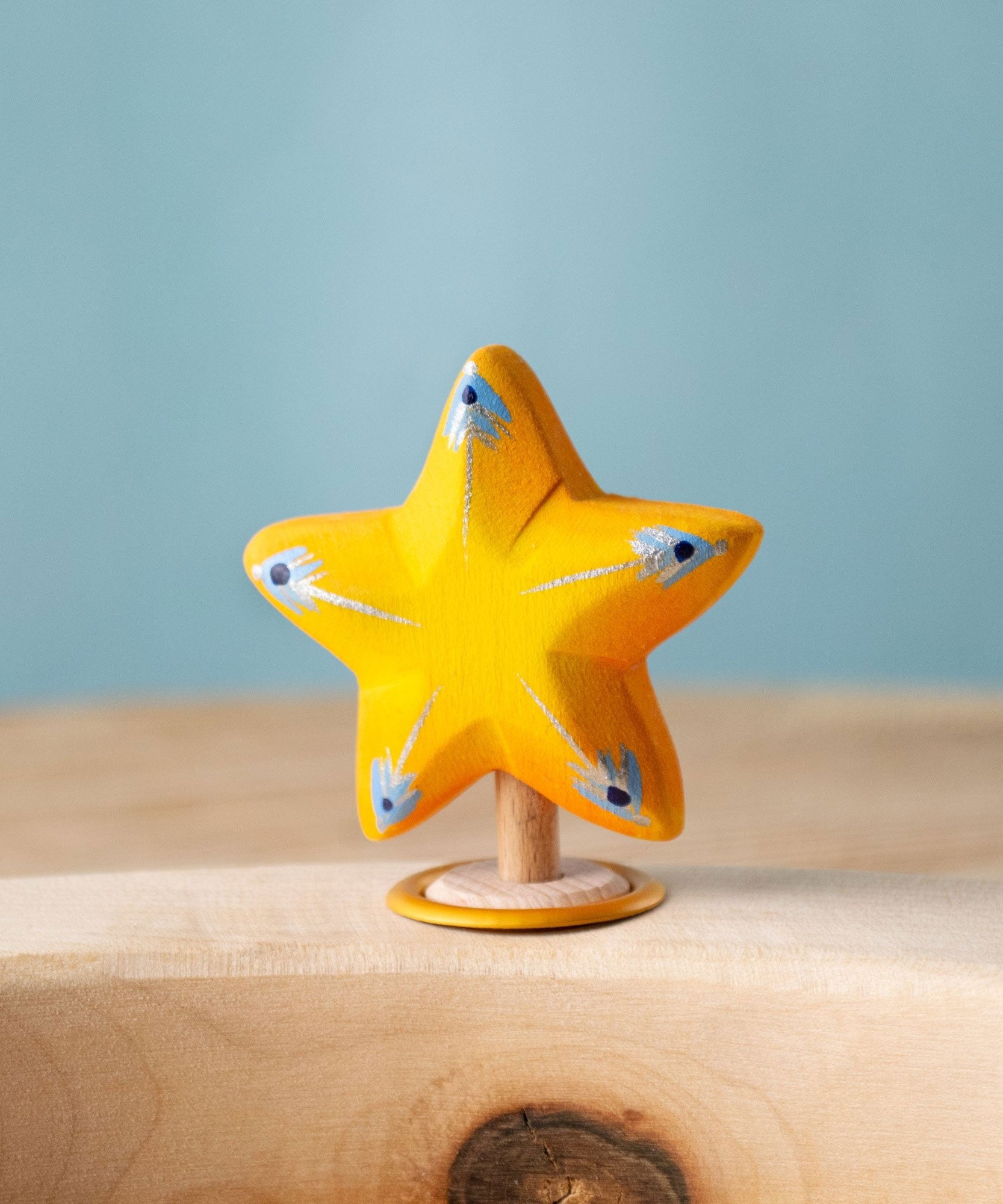 Bumbu yellow Festive Star Celebration decorative Figure to fit on a Grimm's celebration ring. These festive figures are perfect for your Christmas celebration ring set up. These expertly hand crafted items are part of a large range of wooden toys available here at Babipur. 