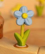 Bumbu wooden blue forget me not decorative figure standing in a celebration ring