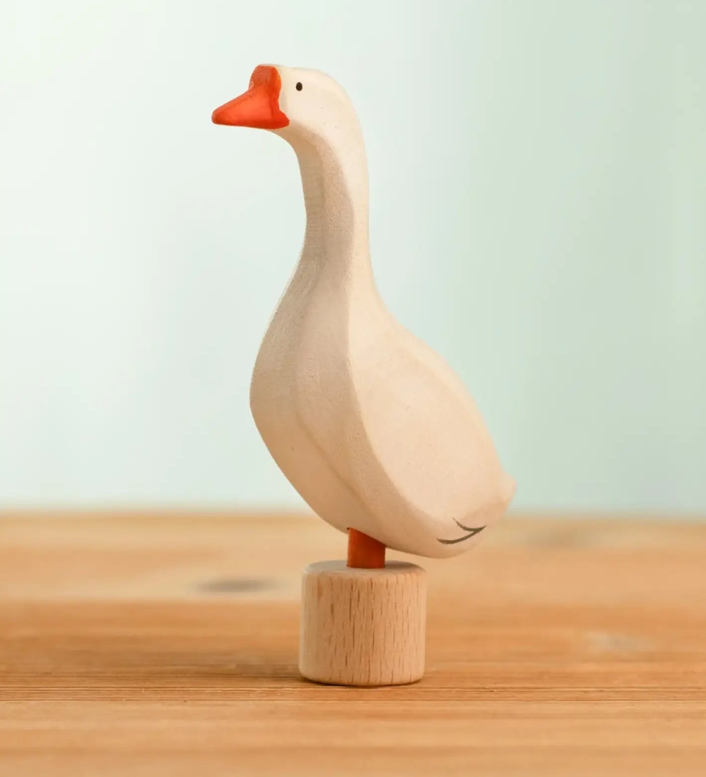 Bumbu handcrafted wooden white festive goose figure standing on wooden base for Grimms celebration ring