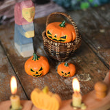Bumbu Halloween pumpkins placed in and around a Kraul basket on a wooden surface. There is a Ostheimer wooden witch figure besides them and a decorated Grimm's celebration ring with lit candle in front of them. These wooden figures are part of a wide range of expertly hand crafted wooden toys here at Babipur.