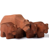 Bumbu plastic free wooden bear figures lined up on a white background