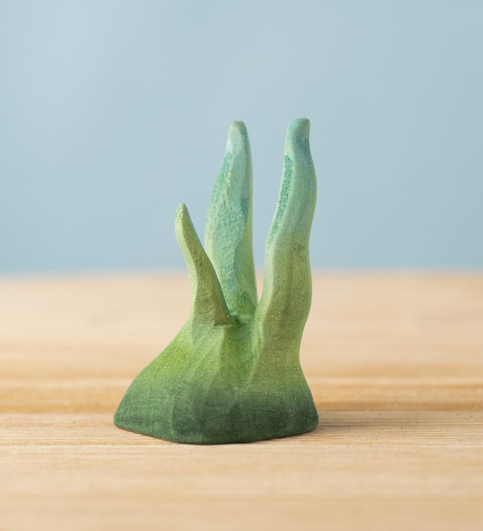 The Bumbu hand carved small wooden seaweed toy, for making underwater play scenes