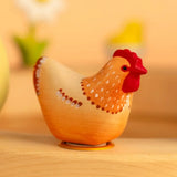 Bumbu wooden brown hen decorative figure standing in a celebration ring