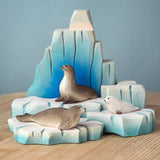 Bumbu handcrafted wooden iceberg  with seal figures resting on individual blocks