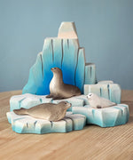 Bumbu handcrafted wooden iceberg  with seal figures resting on individual blocks
