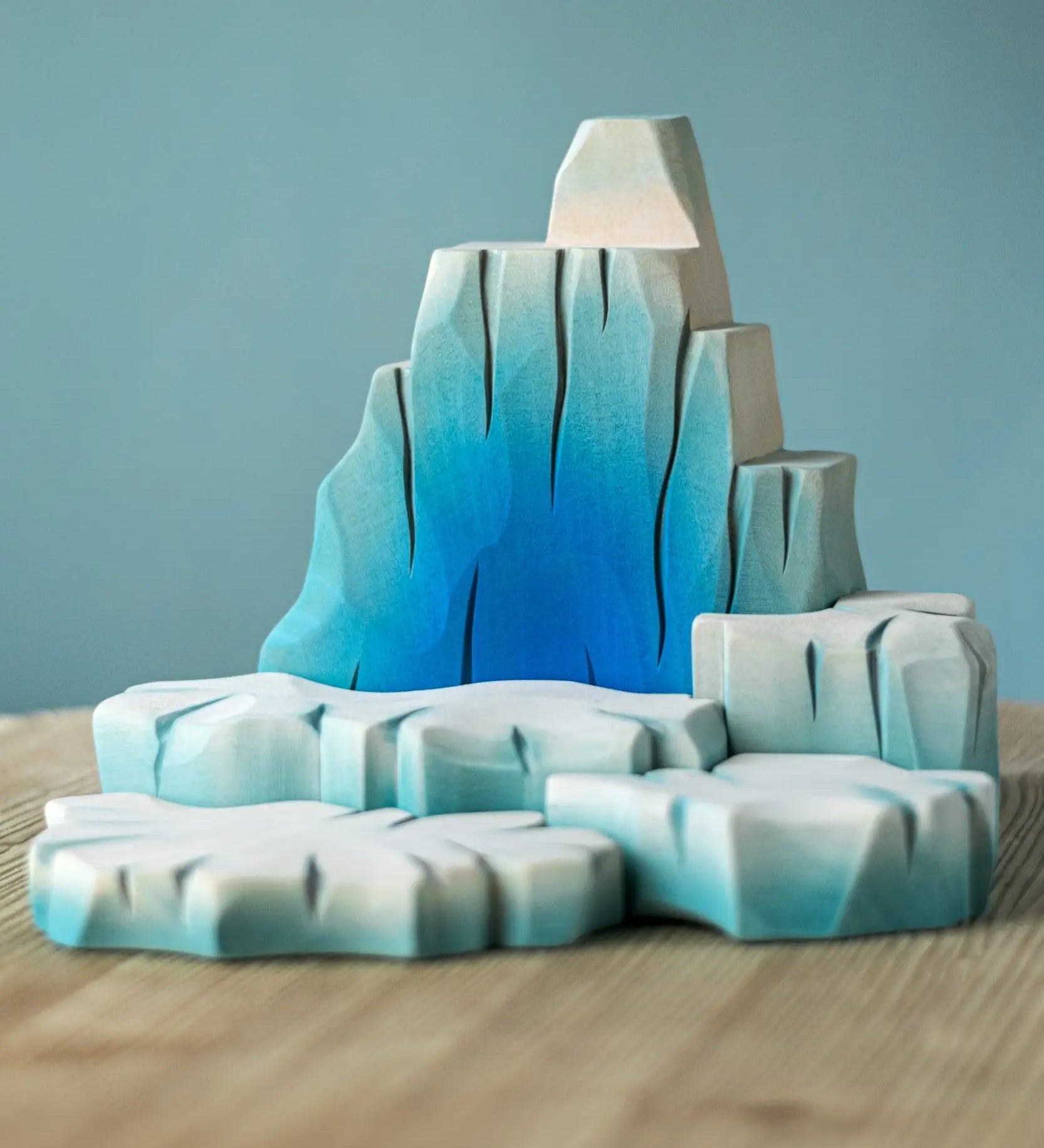 Bumbu handcrafted wooden iceberg set. Includes large blocks in shades of white and blue