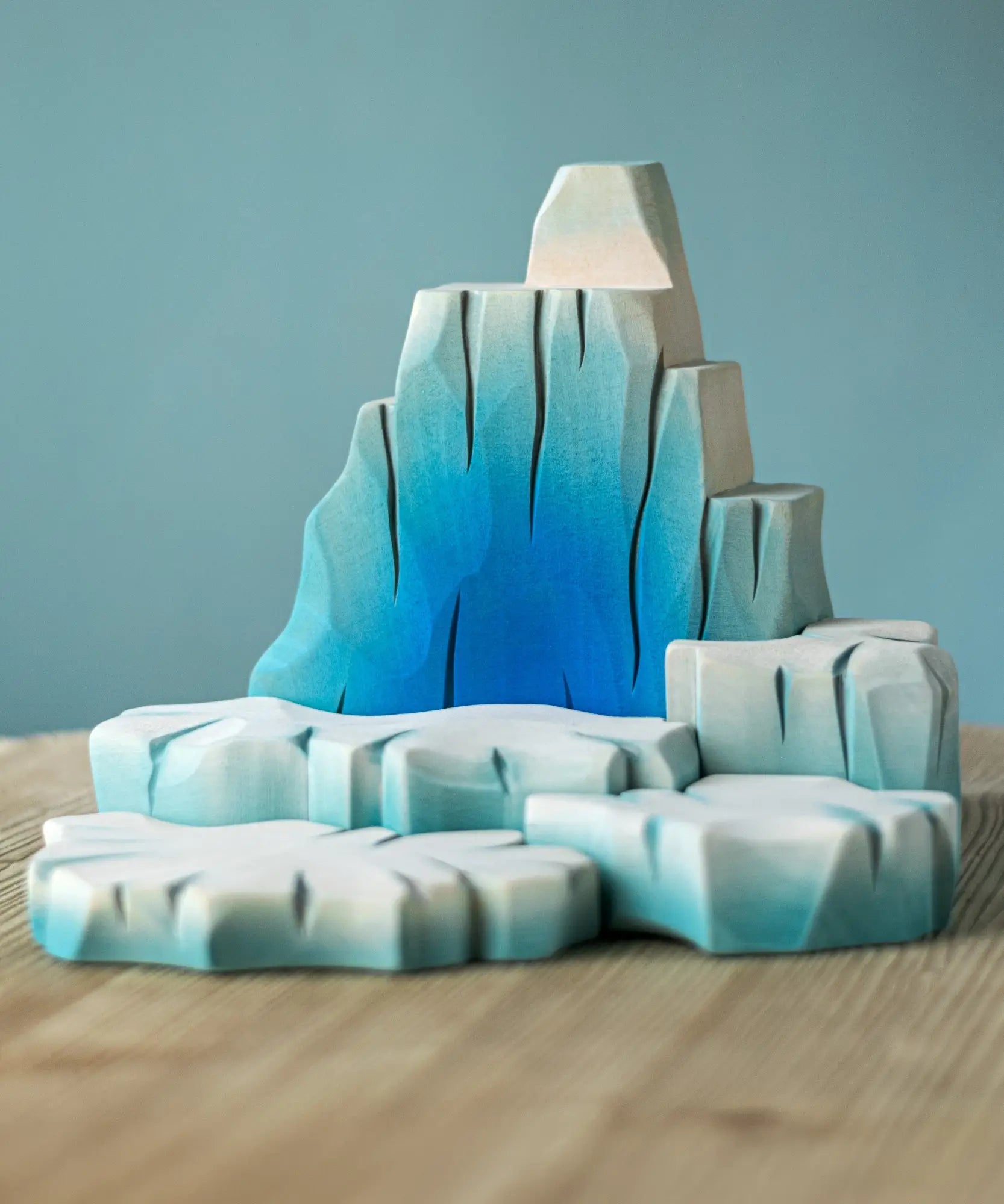 Bumbu handcrafted wooden iceberg set. Includes large blocks in shades of white and blue