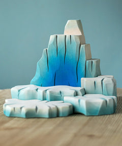Bumbu handcrafted wooden iceberg set. Includes large blocks in shades of white and blue