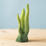 The hand carved large wooden Bumbu seaweed toy, for imaginative play scenes and adding realism to your play