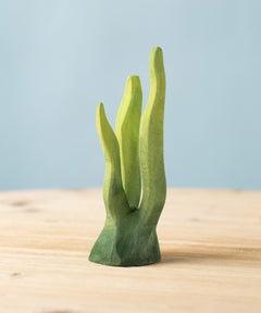 The hand carved large wooden Bumbu seaweed toy, for imaginative play scenes and adding realism to your play