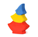 Bumbu hand carved wooden tree toy in the Romanian flag colours on a white background