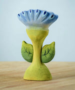 The Bumbu Toys Flama Spring Flower is a blue toned flower with a green coloured stem. 