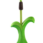 Close up of a green plant from the Bumbu handmade wooden lake and cattail puzzle on a white background