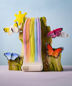 Bumbu wooden Butterflies placed on Bumbu's Rainbow Cliff.