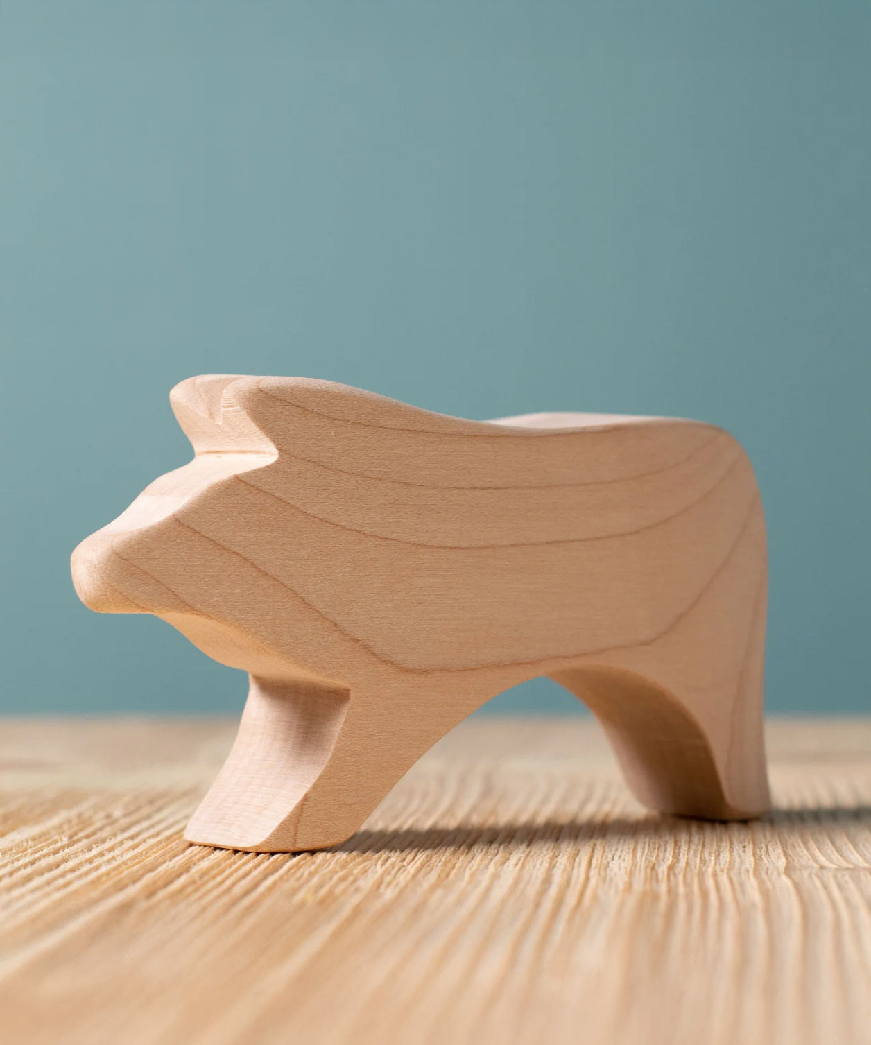 A Bumbu Toys Pig Paint Your Own wooden figure. This DIY wooden toy is part of a range of paint your own figures here at Babipur. 