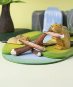 A Bumbu Toys Black Poplar Branch seen in a small world play set up with the Bumbu beavers, lake and waterfall in the background. 