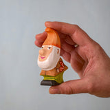 The Bumbu Toys Grumble Dwarf shown in a person's hand. 