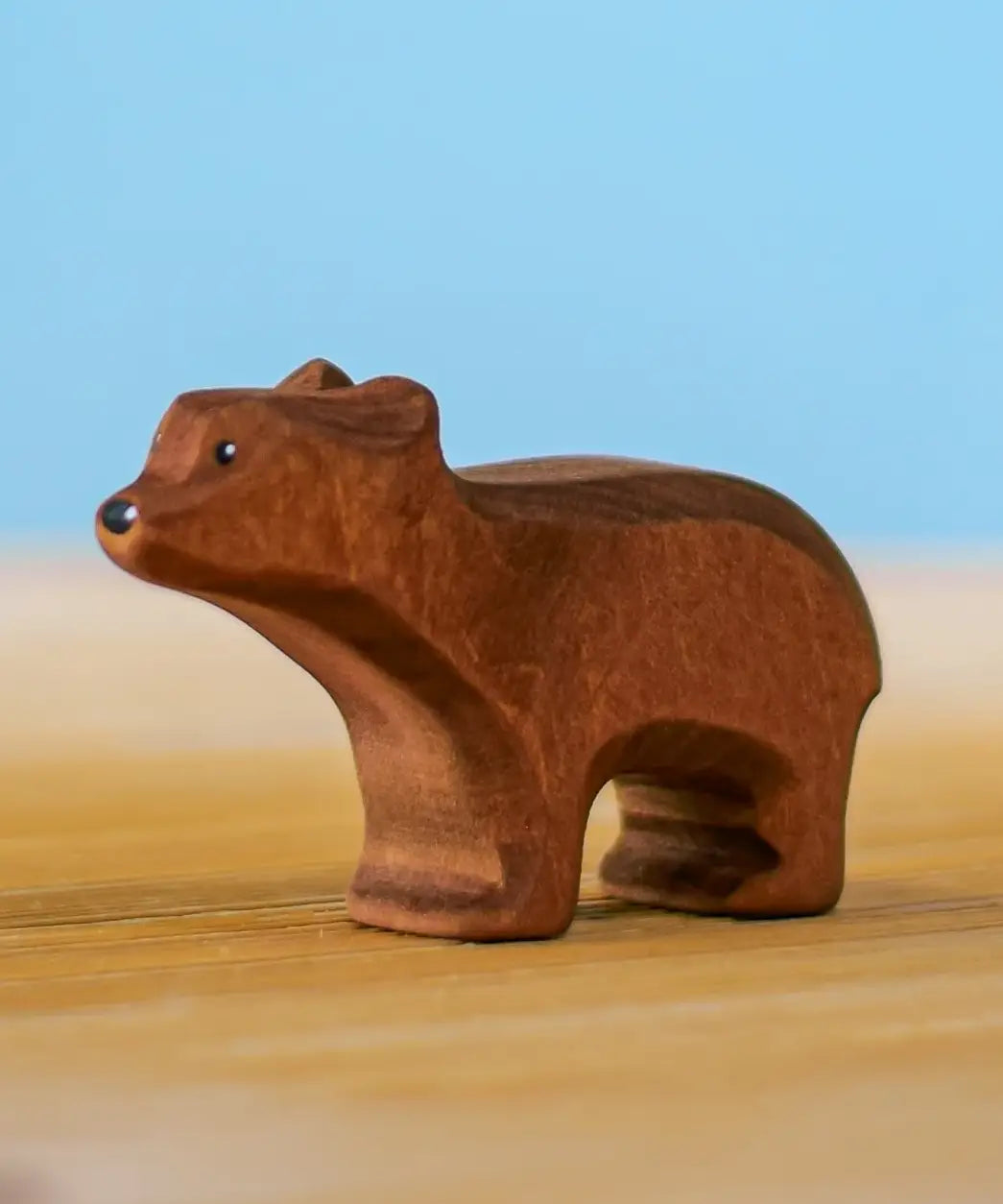 Bumbu toys handcrafted wooden brown standing cub figure with painted facial features