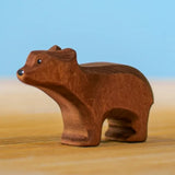 Bumbu toys handcrafted wooden brown standing cub figure with painted facial features