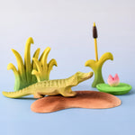 
Bumbu Toys' Little Island in a scene with Bumbu's baby Crocodile, Reed, Water Lily and Cattails.
