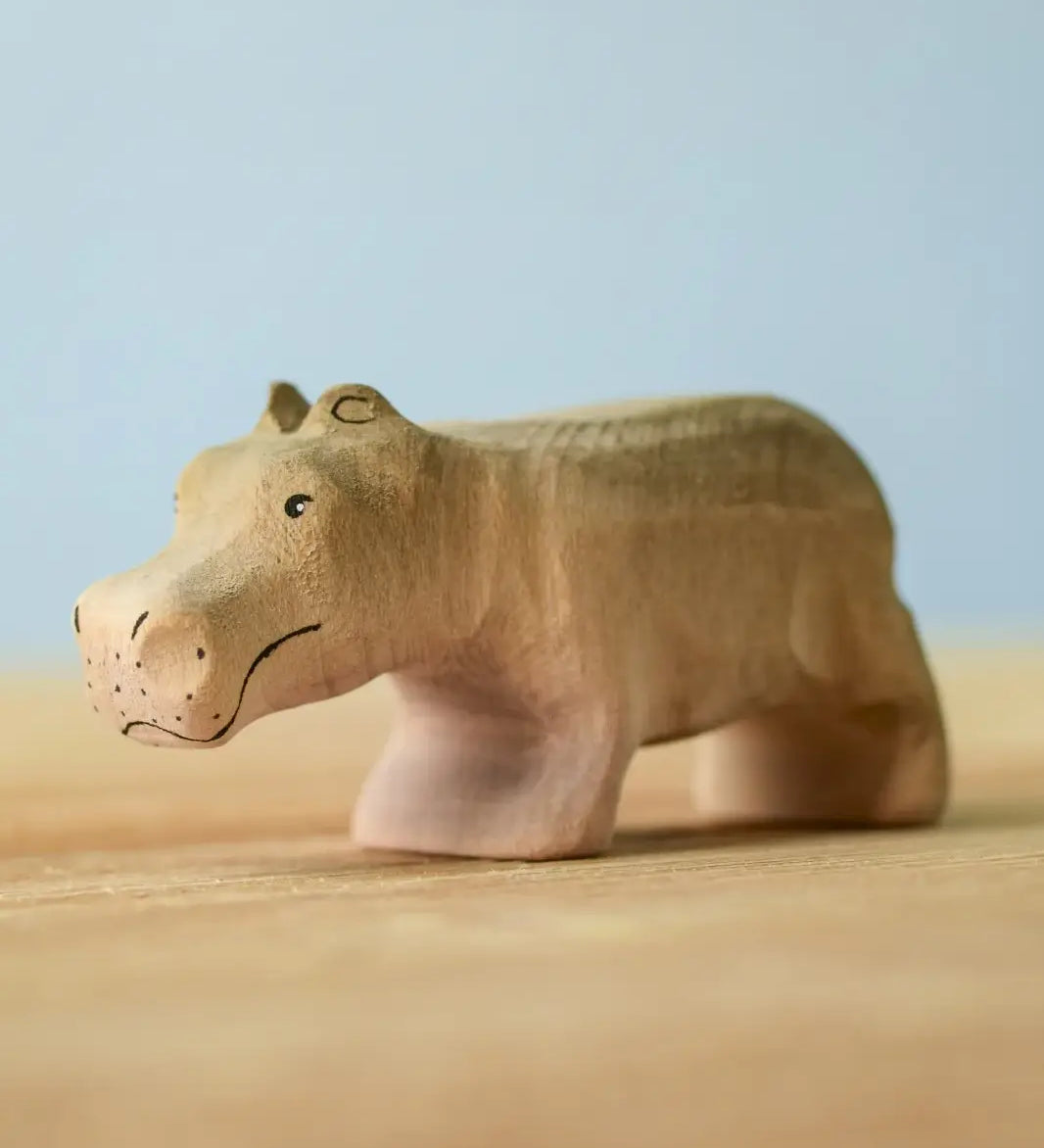 Bumbu toys handcrafted wooden grey standing baby hippo figure with painted facial features