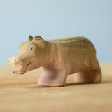 Bumbu toys handcrafted wooden grey standing baby hippo figure with painted facial features