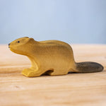 Bumbu wooden beaver figure standing on a wooden board
