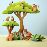 A playscene using Bumbu wooden trees, grass and animal figures including parrots, monkeys and tigers