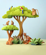 A playscene using Bumbu wooden trees, grass and animal figures including parrots, monkeys and tigers