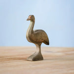 Bumbu wooden female emu figure standing on a wooden board