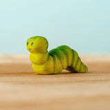 Bumbu handcrafted wooden green caterpillar figure with painted facial features