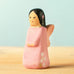 Bumbu handcrafted wooden cherry fairy figure with painted black hair, flowers and facial features